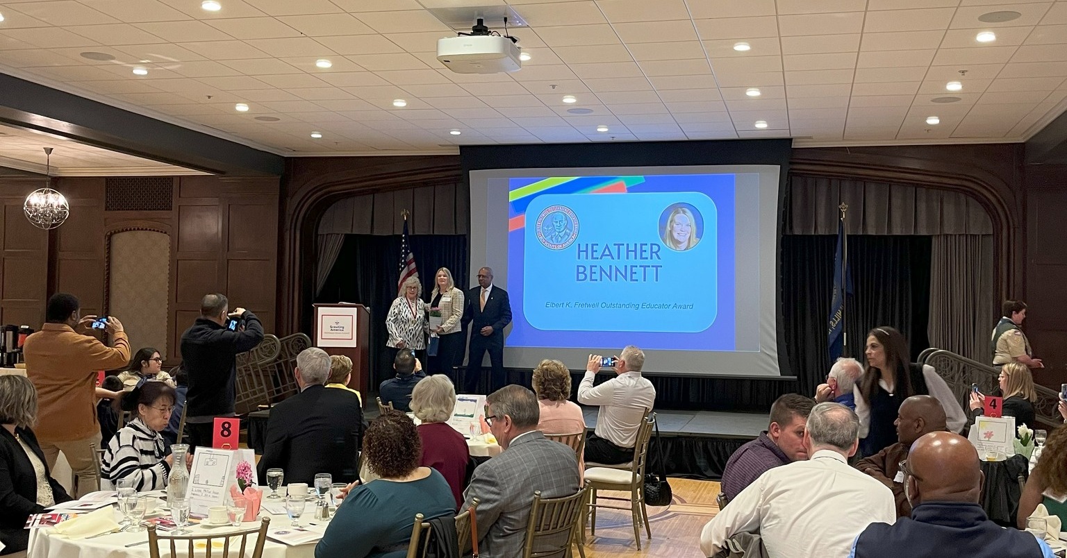 Heather Bennett receives the 2025 Whitney M. Young Award on stage
