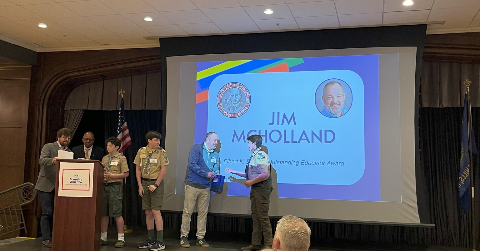 Jim Mcholland receives the 2025 Whitney M. Young Award on stage